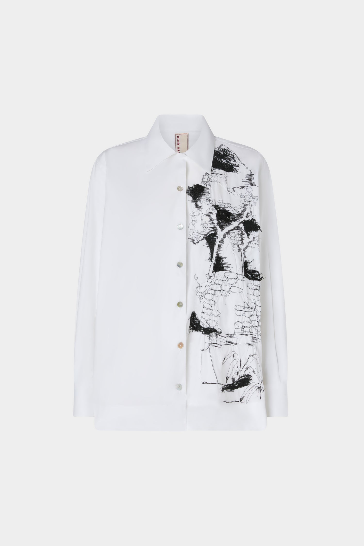 White Shirt Black Embroideries