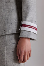 Giacca in tweed di lana vergine con bottoni