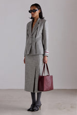 Giacca in tweed di lana vergine con bottoni