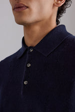 Polo in cashmere con bottoni