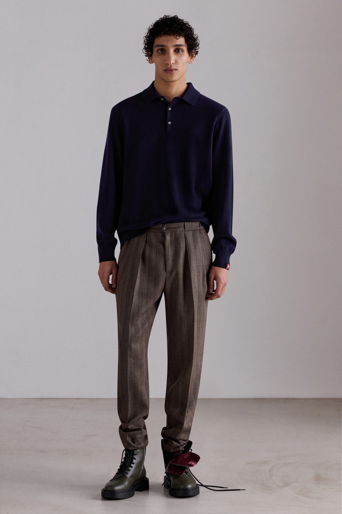 Polo in cashmere con bottoni
