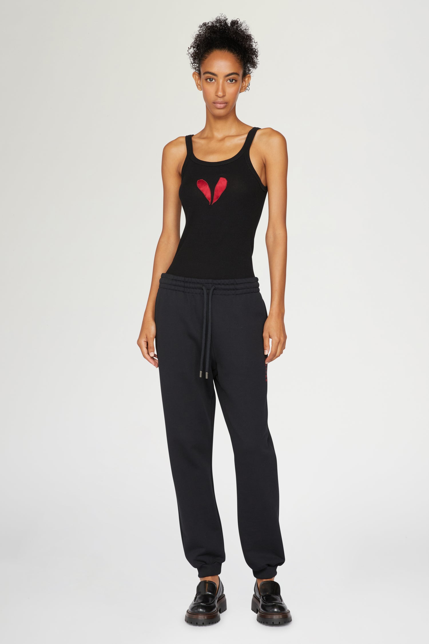Pantaloni con logo