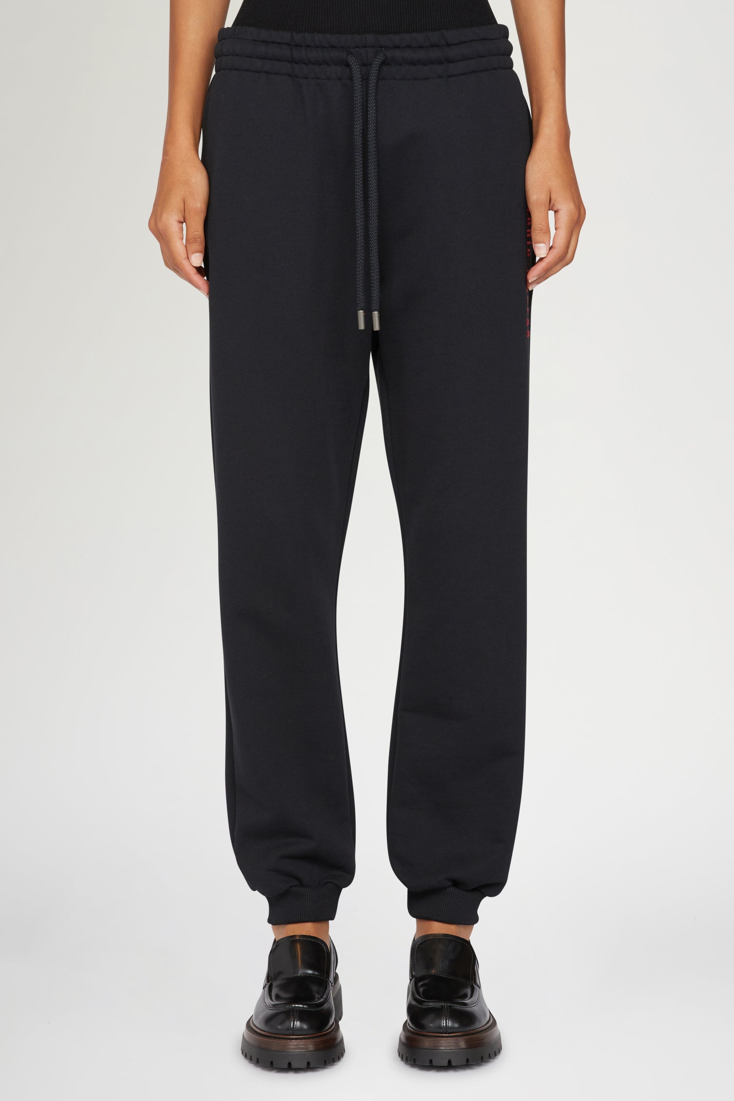 Pantaloni con logo