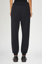Pantaloni con logo