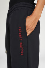 Pantaloni con logo