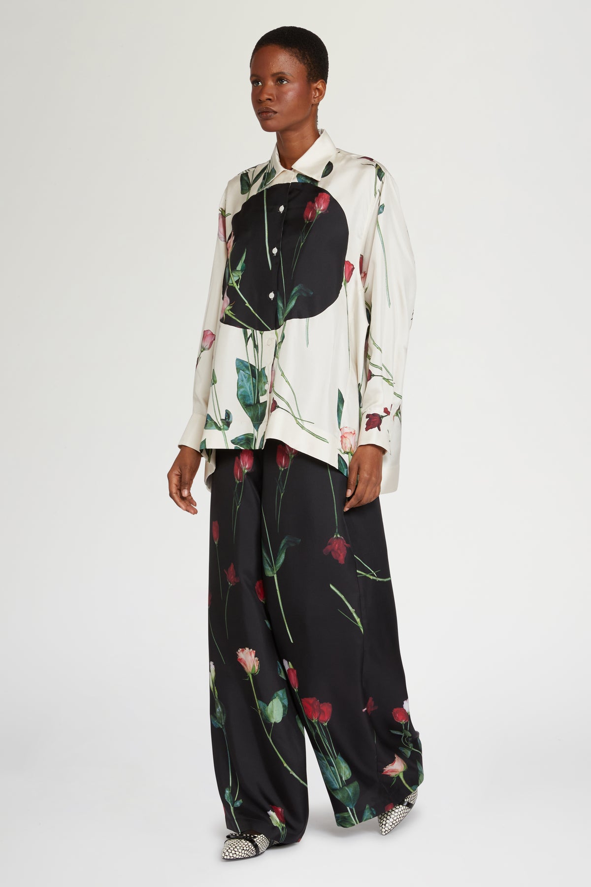Pantaloni in Seta Nera con Stampa Floreale
